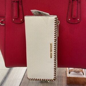 Michael Kors Jet Set Travel Large Pebble Leather Quarter-Zip Wallet
NWT